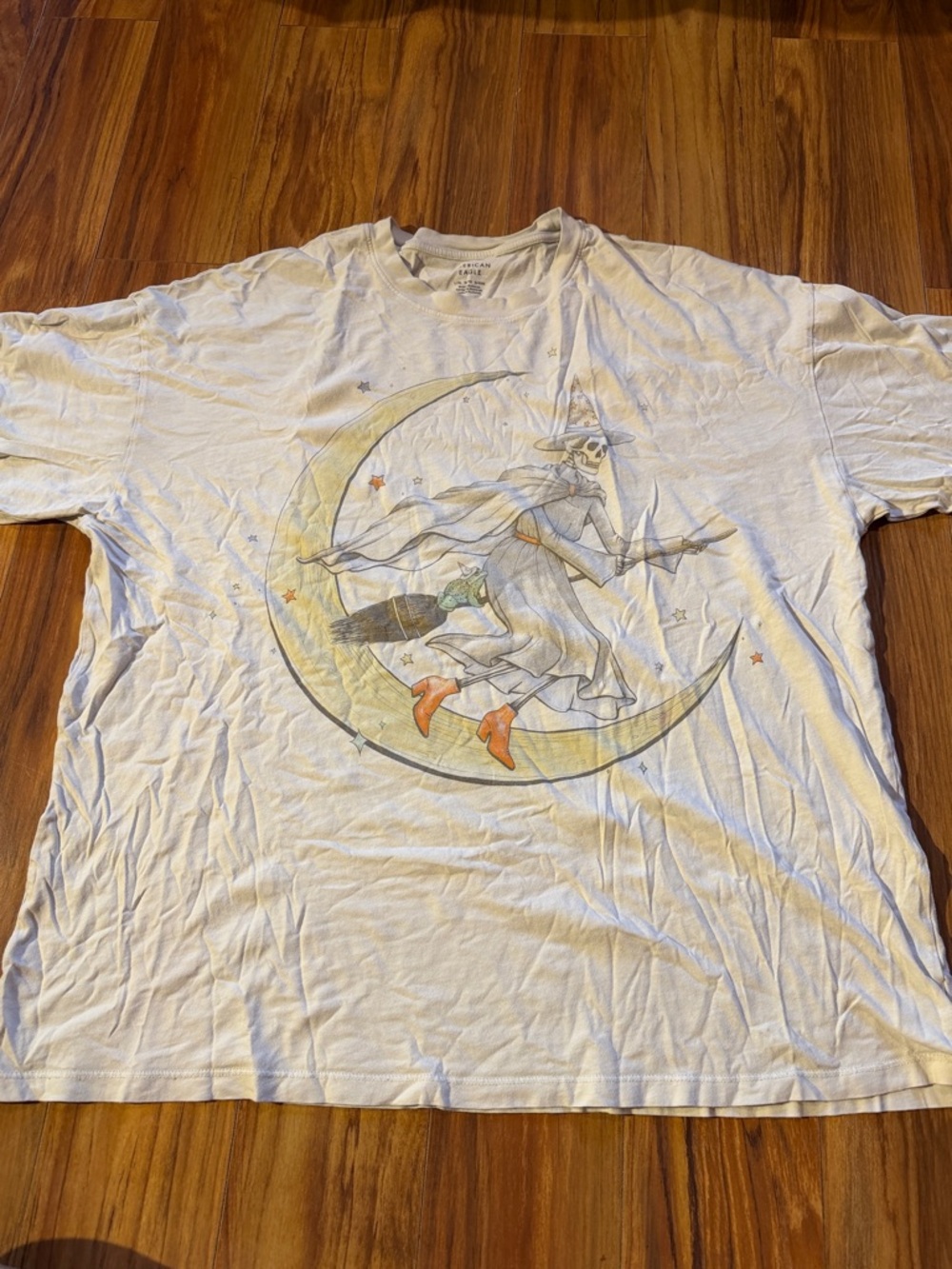 American Eagle Outfitters White Tee with Witch on Crescent Moon Graphic